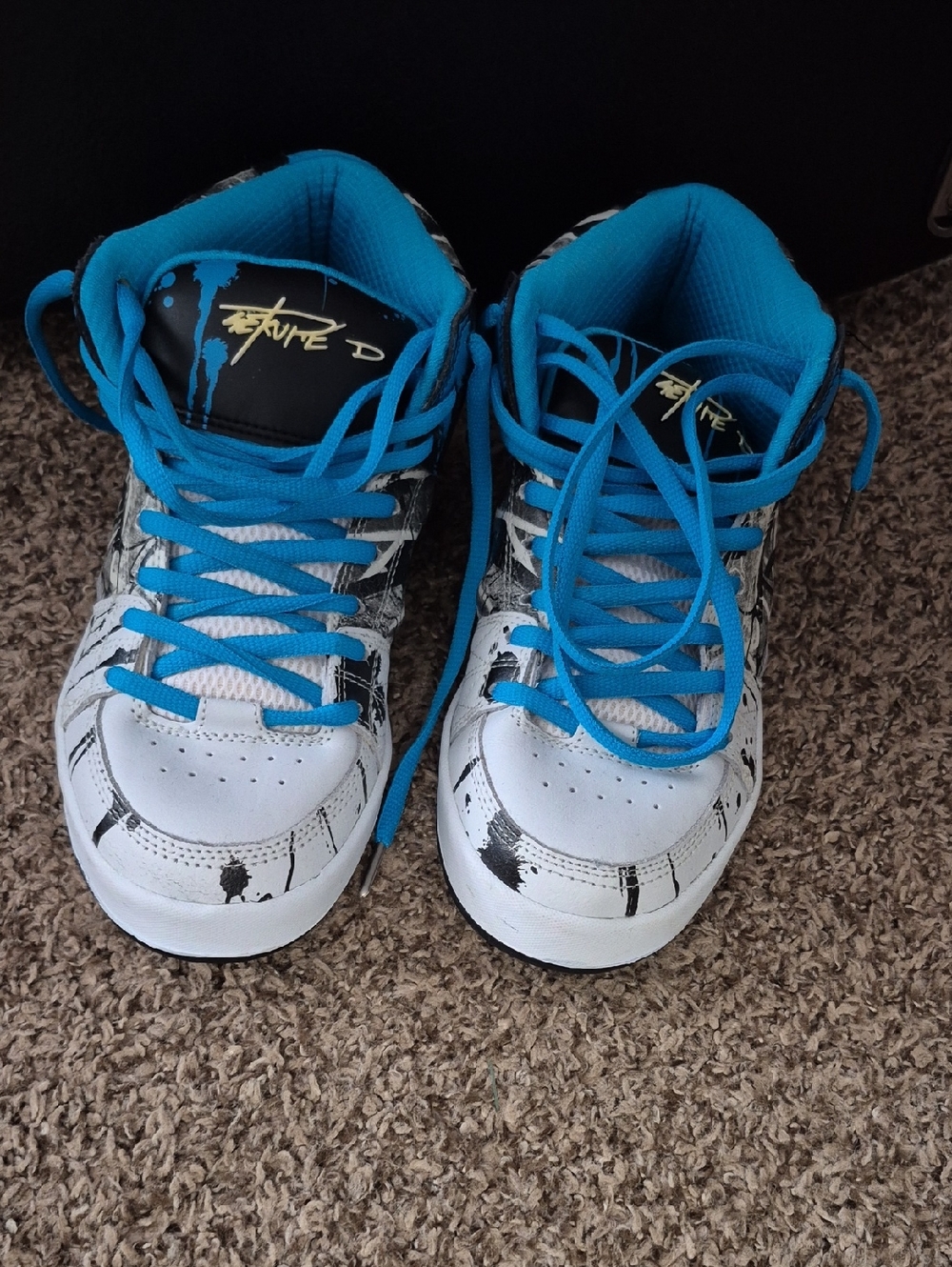 Globe White Athletic Shoes with Bright Blue Laces and Black Paint Accents